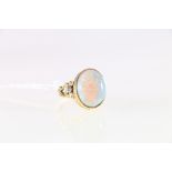 18ct yellow and white gold opal and diamond set cluster ring.