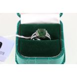 18ct white gold green sapphire and diamond set solitaire ring, 'cushion' cut green sapphire,