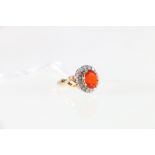 18ct yellow and white gold fire opal and diamond set cluster ring.