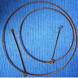 Two antique iron running hoops. 68cm and 50cm diameter respectively.