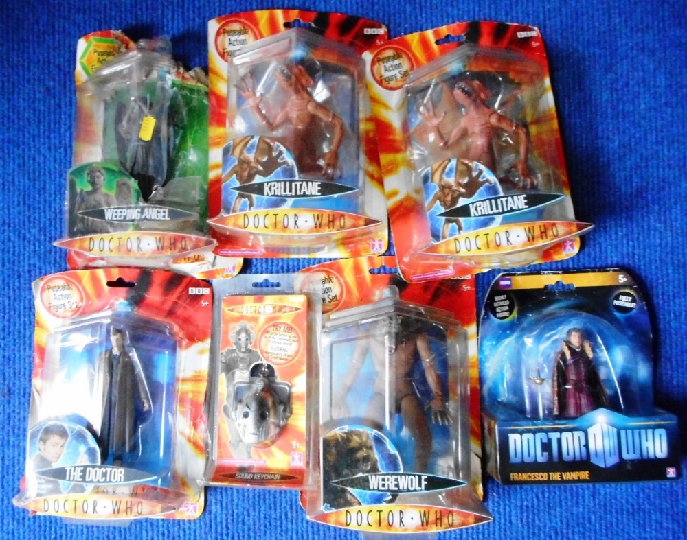 Dr. Who. Seven various packaged figures.