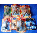 Dr. Who. Seven various packaged figures.