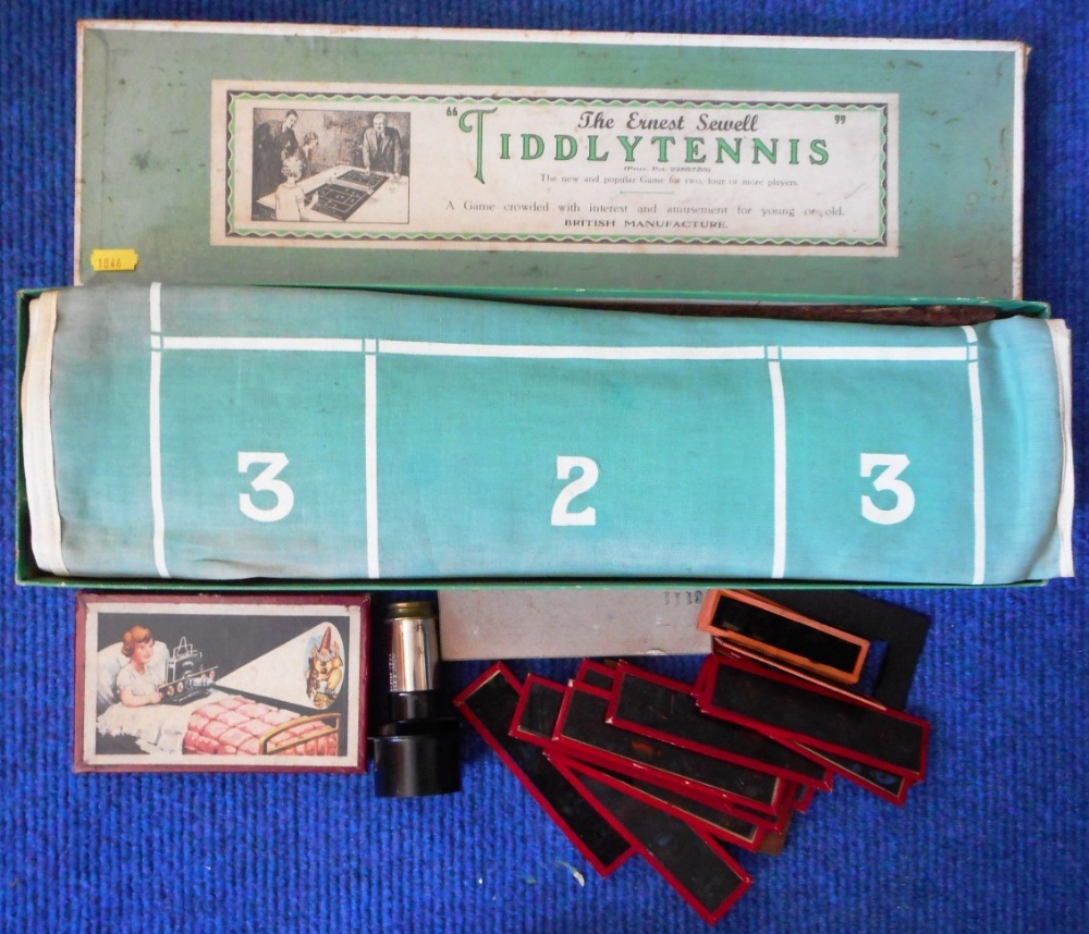 Old Tiddlytennis set, in box. Also child's slide projector with slides. Incomplete in box.