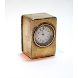 Asprey silver gilt boudoir timepiece of small size, eight days, with circular dial in plain case,