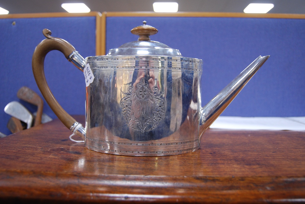 George III silver teapot of oval form with tapering spout, engraved, with opposing cartouches, - Image 10 of 13