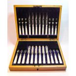 Set of twelve silver dessert knives and twelve forks with pearl handles, by Watson & Gillot,