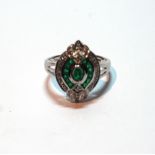 Diamond and emerald cluster finger ring with baguette and oval emeralds and small brilliants,