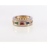 Yellow metal eternity ring combined channel-set with diamonds and other gemstones, size R, 15g.