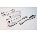 Three silver sugar tongs and two butter knives, 1815/1859, 6½oz.