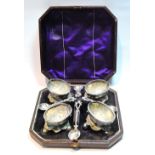 Unusual set of four EP salts modelled as half walnut shells upon leaves, on ball feet, with spoons,