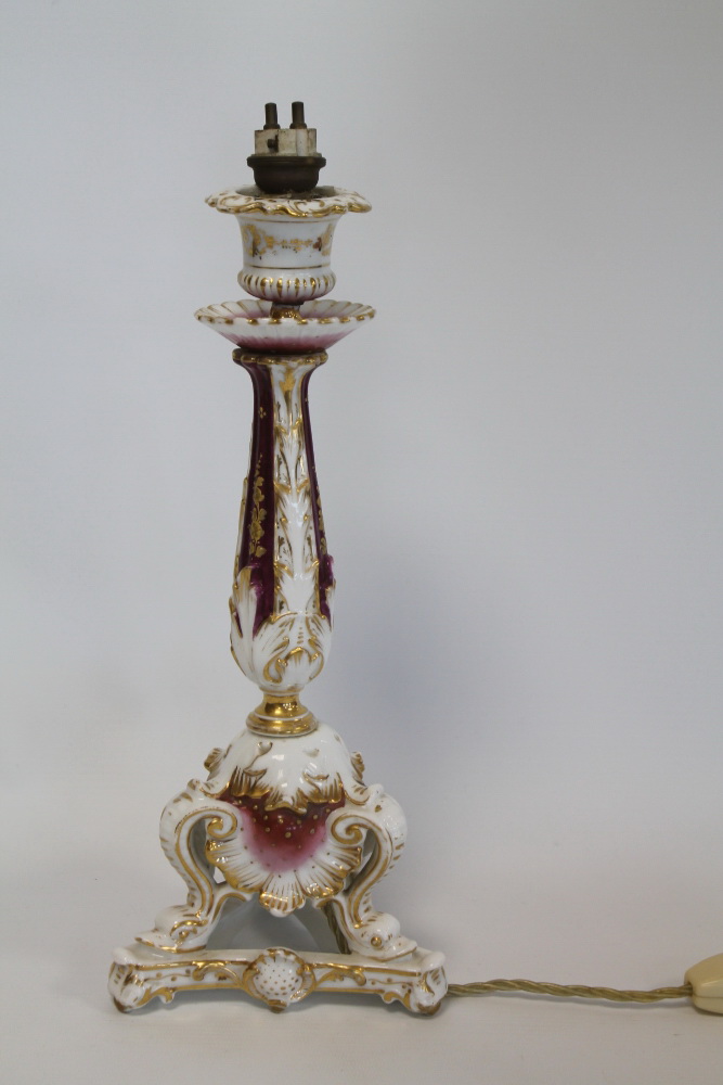 Late 19th century / early 20th century continental porcelain candlestick on triangular base