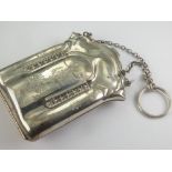 Silver embossed purse of arcaded form, Birmingham, 1917.