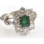 Diamond and emerald oval cluster ring, rectangular with eight brilliants each approx. .