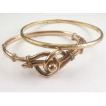 9ct gold slave bangle and another '9c'. (2). Condition Report. 16g.