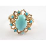 Gold ring with oval turquoise open cluster, '750'. Size 'O'. Condition Report. 4.2g.