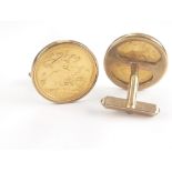 Pair of cuff links each with a half sovereign in 9ct gold swivel fittings.