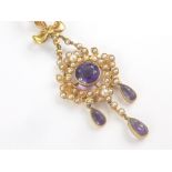 Victorian gold pendant with amethysts and pearls on Prince of Wales necklace, '15' and '9ct'.