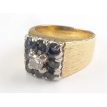 Ring with square diamond and sapphire cluster on hammered gold shank '18ct' . Size 'I'.