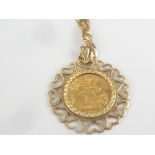 Sovereign 2000 with 9ct gold detachable mount with necklace. Condition Report. 19g.