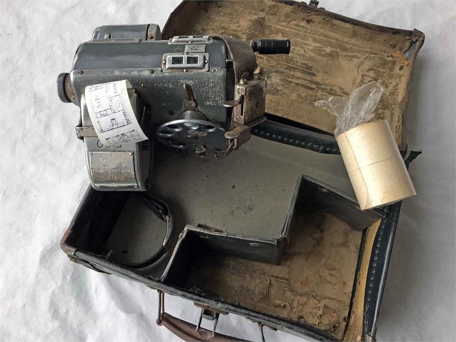 A pre-decimal TIM TICKET MACHINE ex Glasgow Corporation Transport, complete with leather strap and