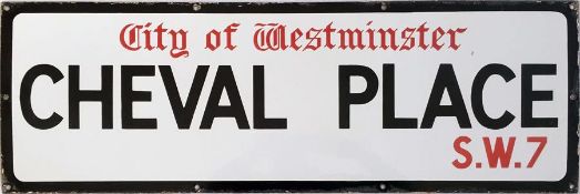 A City of Westminster enamel STREET SIGN from Cheval Place, SW7, just off the Brompton Road, round