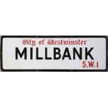 A City of Westminster enamel STREET SIGN from Millbank, SW1 which runs alongside the Thames down