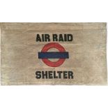 A WW2 London Transport cotton FLAG 'Air Raid Shelter' with the LT bullseye. Presumably issued to