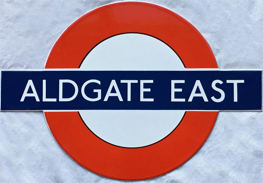 A small London Underground enamel PLATFORM BULLSEYE SIGN from Aldgate East station. Believed to have