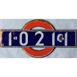 London Underground enamel STOCK-NUMBER PLATE from 1938-Tube Stock Driving Motor Car 10211. These