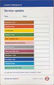 London Underground ENAMEL SIGN 'Service update' with each line listed in its background colour and a