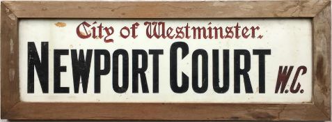 A c1930s City of Westminster opal glass STREET SIGN from Newport Court, WC, a street off Charing