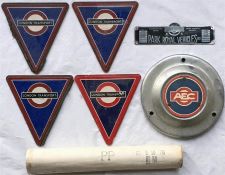 Selection of London Transport Routemaster bus items comprising 4 x plastic radiator grille BADGES, a