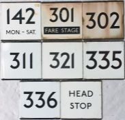 Selection of London Transport bus stop enamel E-PLATES comprising routes 142, 301 Fare Stage, 302,