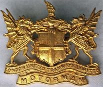 c1910 London United Tramways CAP BADGE 'Motorman' (driver). A brass badge featuring the company's