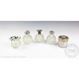 A collection of five toilet jars comprising; a pair of Edwardian scent bottles, William Devenport,