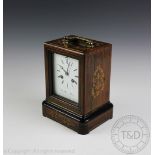 A 19th century French rosewood and marquetry inlaid mantel clock,