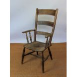 A Victorian beech country kitchen chair, with solid seat, on turned legs,