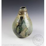 A Paul Jackson studio pottery textured nude series vessel, salt glazed type decorated,