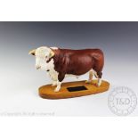 A collection of Beswick comprising; a Beswick Connoisseur series Hereford bull, model number A2542A,