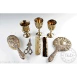 A selection of silver comprising; a four piece silver backed dressing table set, stamped 'Filled',