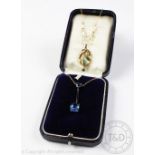 A 9ct yellow gold and blue stone set pendant, early 20th century within 'R French Jeweller,