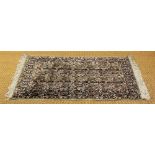 A Persian soft ground rug,