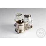 A silver three piece condiment set retailed by Dobsons Piccadilly, Frederick Brasted, London 1866,
