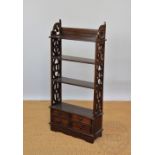 A Regency style mahogany dwarf open bookcase,