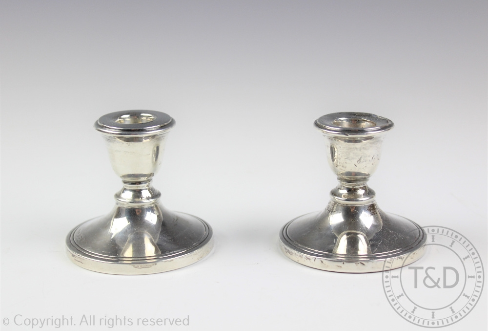 A pair of Art Deco silver short candlesticks, S Blanckensee & Son Ltd, Birmingham 1922,