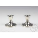 A pair of Art Deco silver short candlesticks, S Blanckensee & Son Ltd, Birmingham 1922,