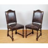 A set of six late 17th century style carved walnut dining chairs,