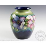 A large Moorcroft clematis pattern vase,