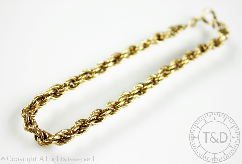 A 9ct yellow gold rope twist bracelet, with attached bolt ring clasp, weight 5. - Image 2 of 2