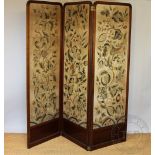 A late Victorian mahogany three bi-fold room screen, one side embroidered with birds and flowers,